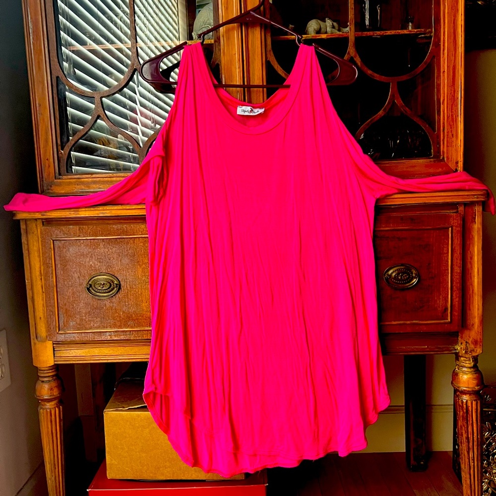 Long shirt or tunic. Can be worn either way. Fuschia pink.